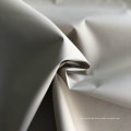 230t Full Dull Plain Weave Nylon Taffeta Fabric with Bonded Milky Printed Membrane for Garment